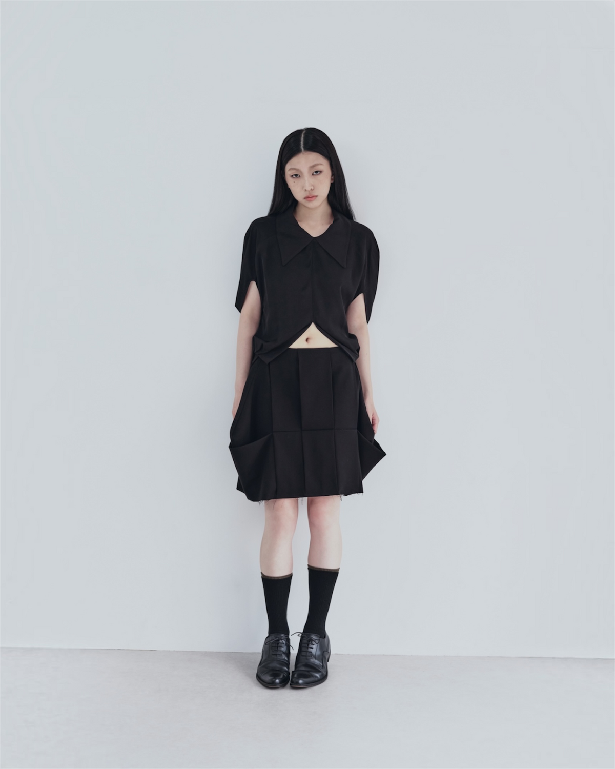 SCULPTED PLEATED SKIRT